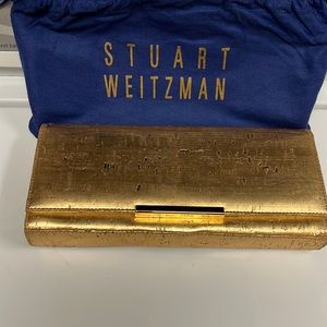 NWOT Stuart Weitzman gold clutch with strap magnetic closure